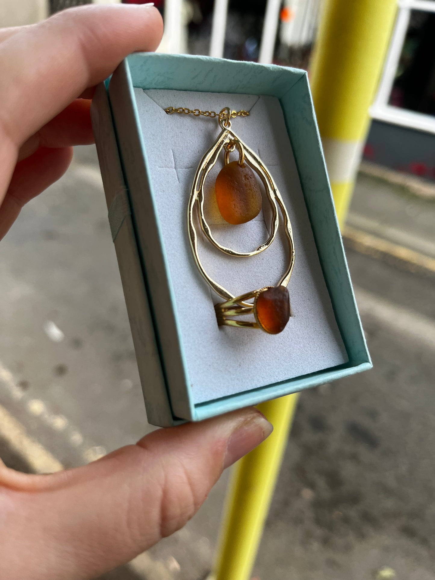 Whitby Sea Glass on gold-plated ripple pendant with matching ring (Burnt Umber)